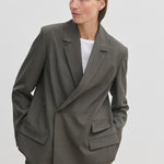 A person wearing a grey Amalfi Regular Blazer with structured shoulders over a white crew-neck t-shirt.