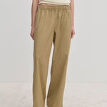 Beige Davi Mid waist Pants featuring an elasticated waistband and a wide-leg, straight-fit silhouette.