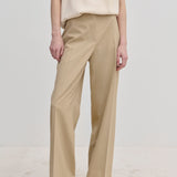 Beige Ivano Mid waist Pants by Herskind ApS in a straight-leg, regular fit with center-front creases.
