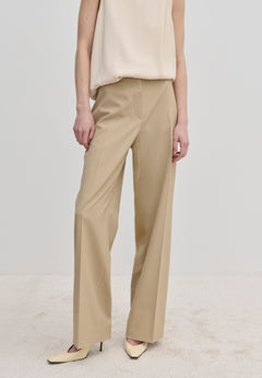 Beige Ivano Mid waist Pants by Herskind ApS in a straight-leg, regular fit with center-front creases.