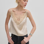 Filippa Top cream-colored camisole with a lace V-neckline and adjustable straps.