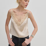 Filippa Top cream-colored camisole with a lace V-neckline and adjustable straps.