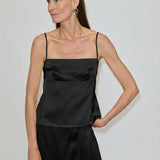 Black Angela Top by Herskind ApS featuring a square neckline and thin, adjustable spaghetti straps.