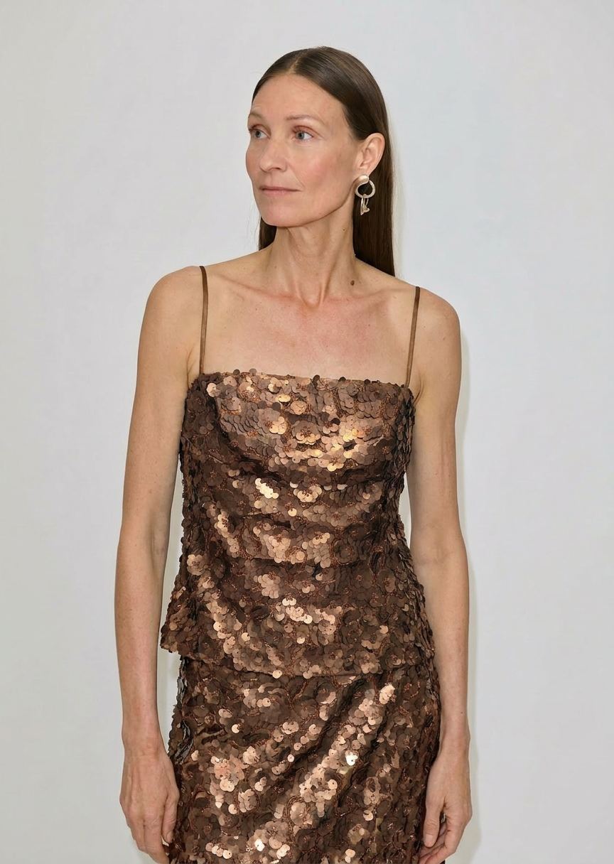 The Herskind ApS Angela Top is a hip-length, brown camisole with a square neckline and metallic sequins.