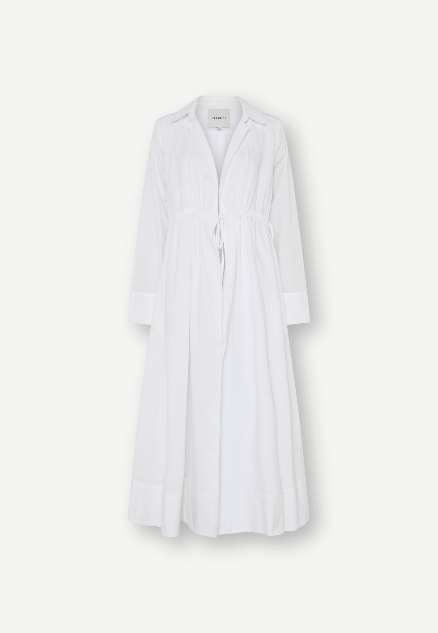 Gigi Dress - White: a long-sleeved midi wrap dress in white BCI cotton with a collared neckline and a drawstring waist.