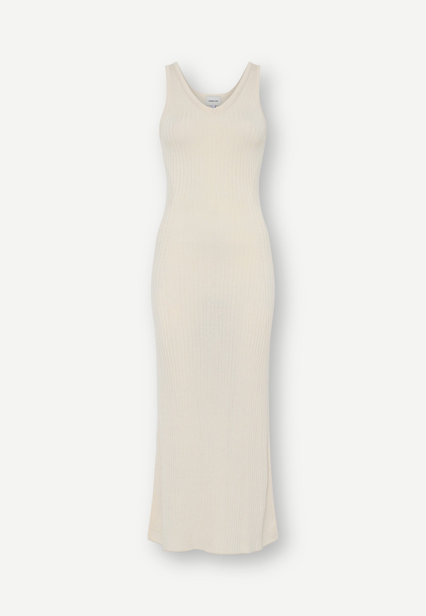 Herskind ApS Sugar Knit dress - Off White in an off-white ribbed knit midi design with a V-neckline and a fitted, sleeveless bodice.